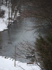 Contemplative scene of a river and snow symbolizing the introvert life personality